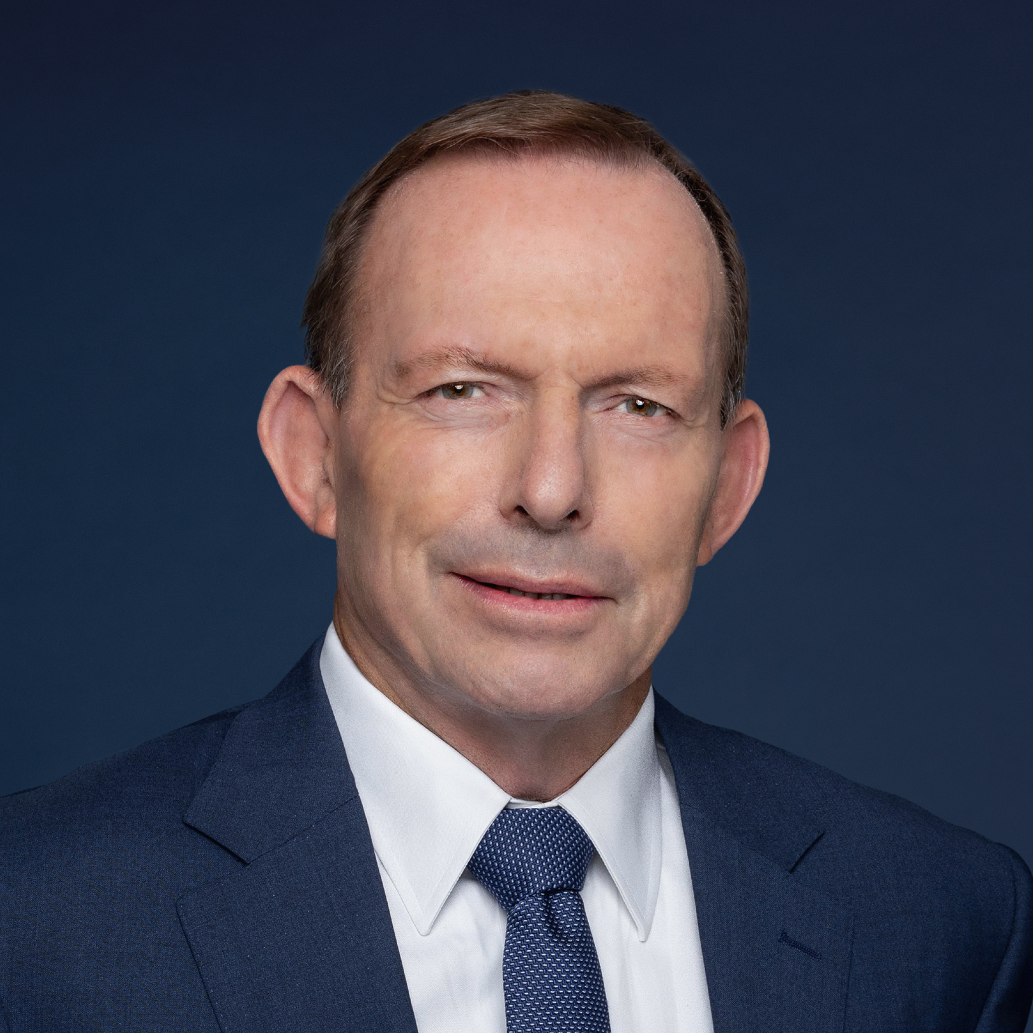 Tony Abbott profile photo. He wears a blue suit and tie.