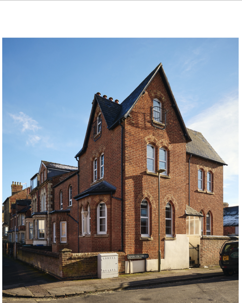 James Street exterior: a red brick three-storey house on the corner of two streets