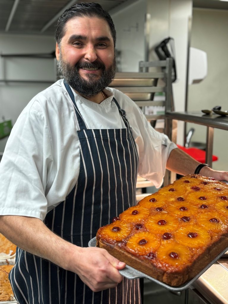 Chef de partie Bogdan Mihai (Bobby) with pineapple upside down cake