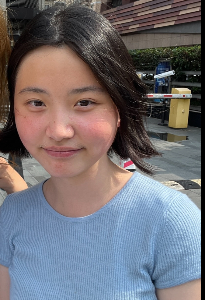 Profile photo of Lexi wearing a light blue t-shirt